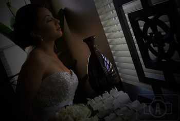 deep breathing bride on the window